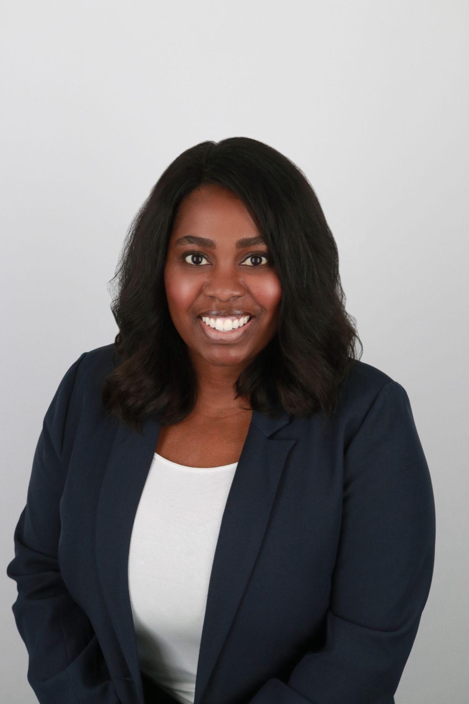 Professional headshot subject preparing for an office headshot session