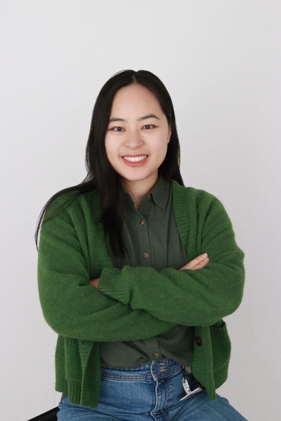 A polished budget-friendly headshot with soft lighting and a simple background